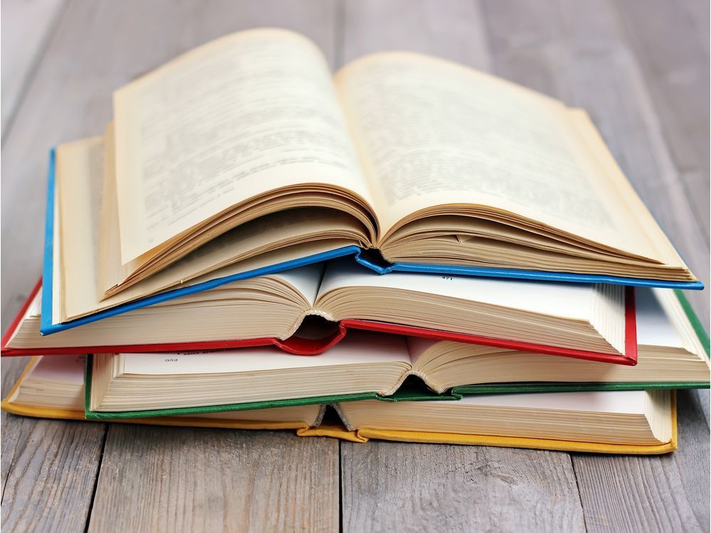 A stack of books on the table. Photo by Getty Images.
